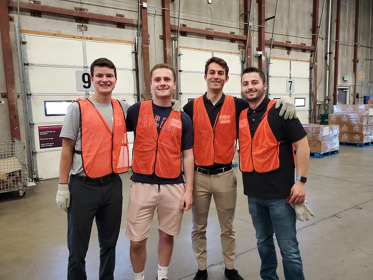 Colorado interns working in a warehouse
